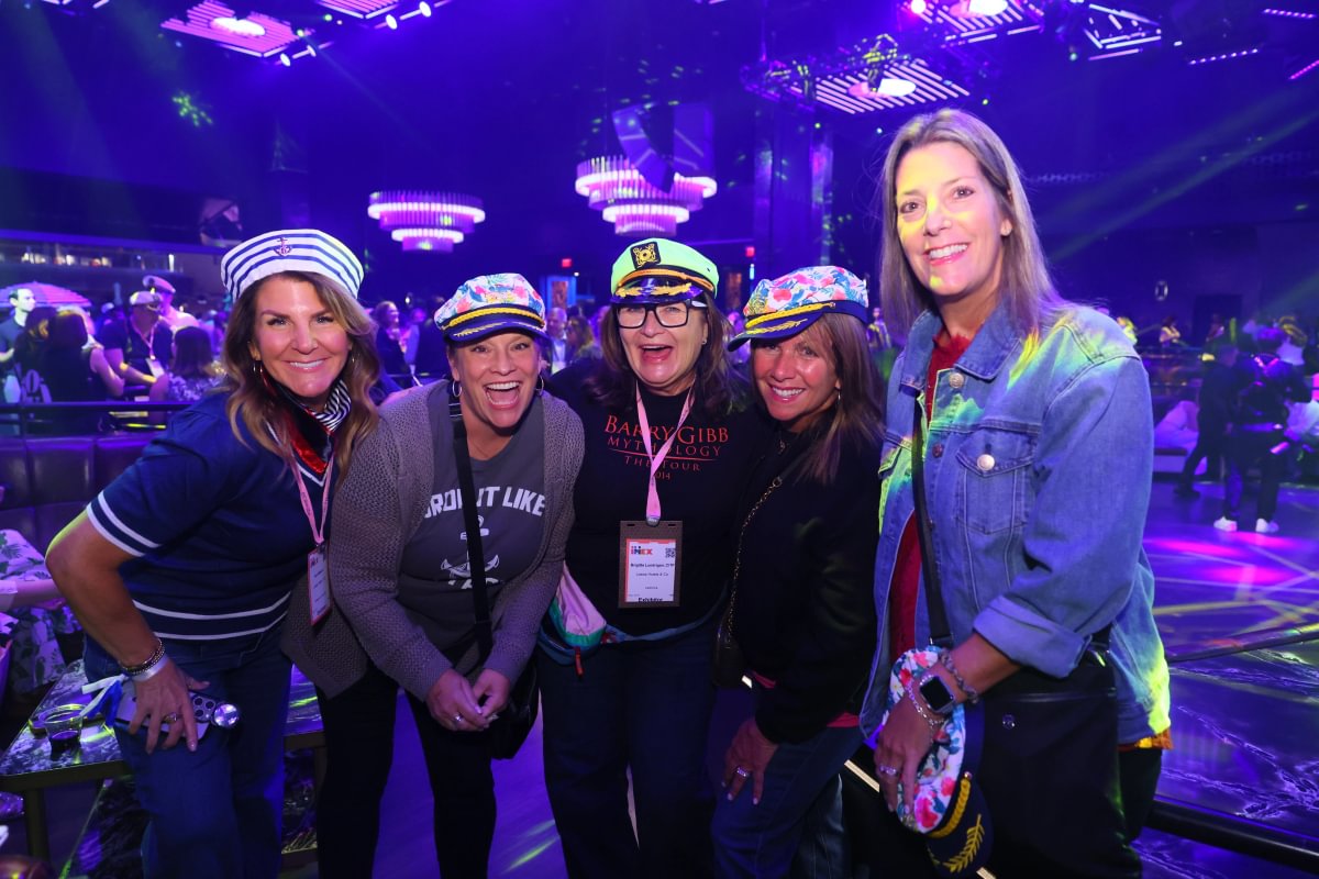 Attendees together at an IMEX America evening event