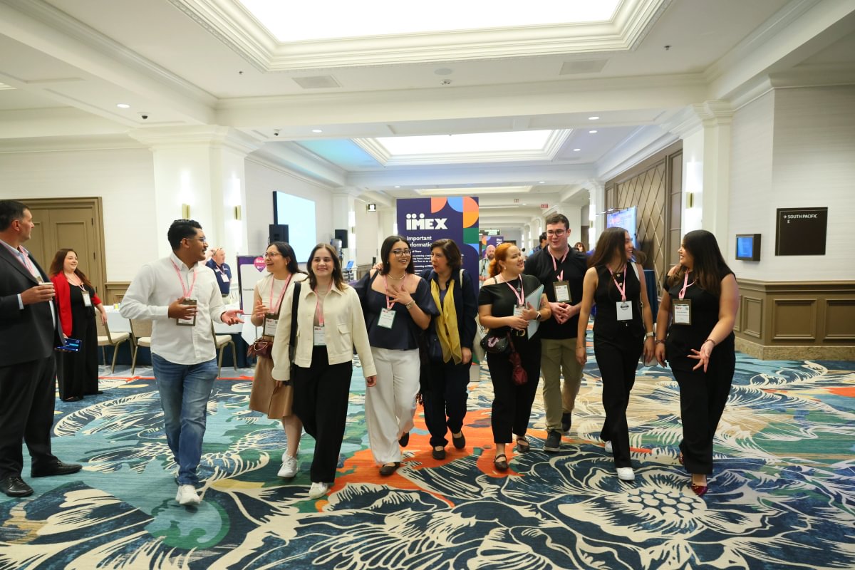 Attendees walking and networking at Smart Monday