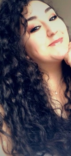 Zina A. Headshot Zina A. Headshot